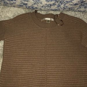 light brown sweater